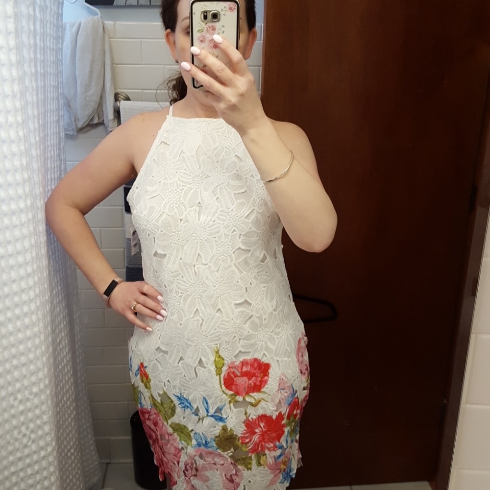 White lace dress with floral accents